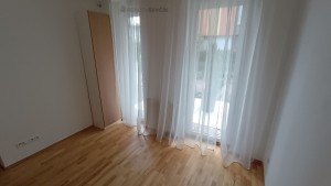 Byt 2+kk se zahradou 59 m², terasou a garážovým stáním v uzavřené Rezidenci Libuš, Praha 4