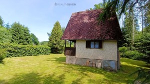 Prodej dřevěné chaty na soutoku Malše a Stropnice s vlastním pozemkem 553 m2